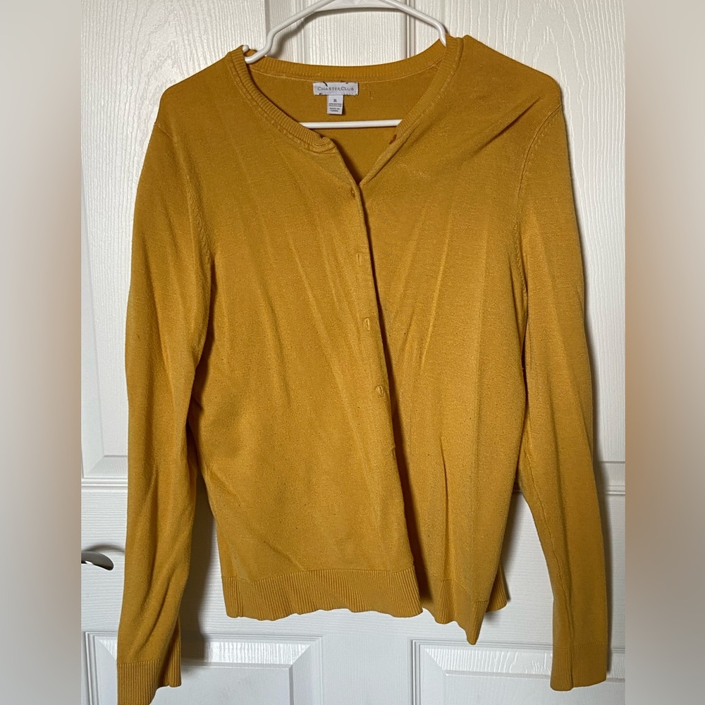 Golden colored cardigan